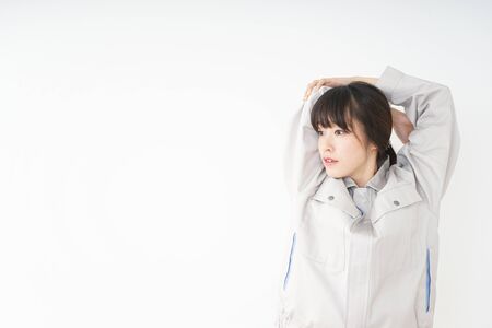Woman working with uniformの写真素材
