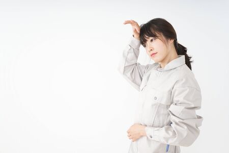 Woman working with uniformの写真素材