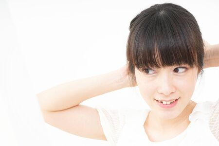 Young woman doing skin careの写真素材