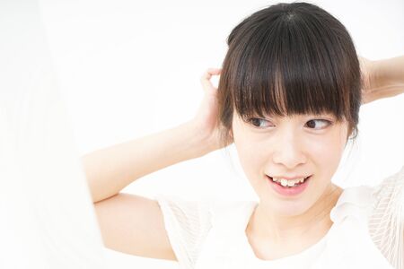 Young woman doing skin careの写真素材