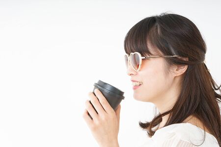 Young woman spending in the beachの写真素材