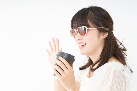 Young woman spending in the beachの写真素材