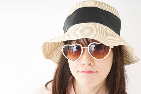 Young woman spending in the beachの写真素材