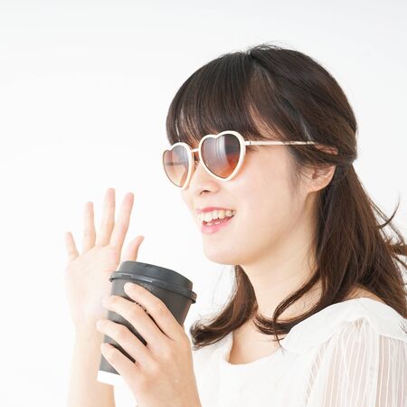 Young woman spending in the beachの写真素材