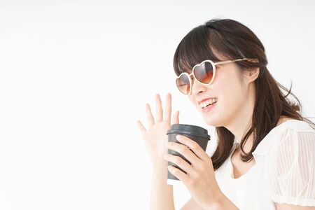 Young woman spending in the beachの写真素材