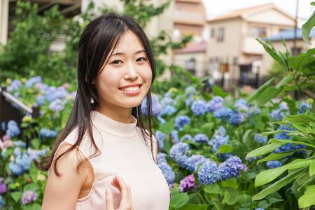 Young woman seeing plantsの写真素材