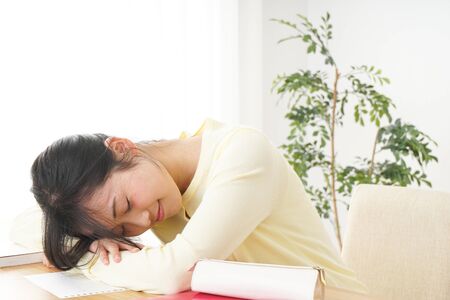 Young woman having lack of sleepの写真素材