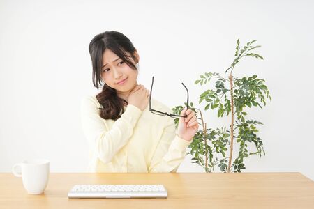 Young woman being be fatigued with office workの写真素材