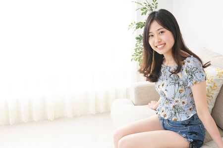 Young woman enjoying summerの写真素材