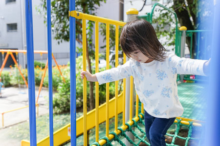 Child playing in the parkの写真素材