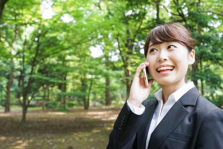 Business woman talking on phoneの写真素材