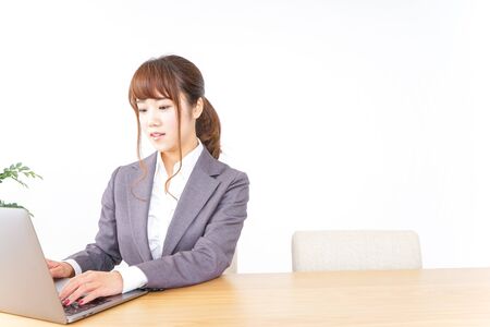 Business woman using a laptopの写真素材
