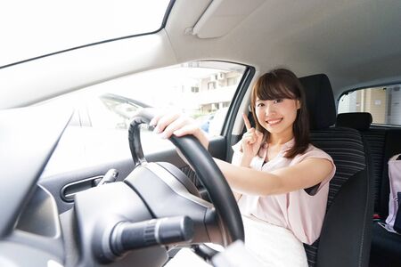 Young driver pointing somethingの写真素材
