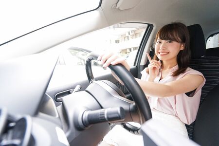 Young driver pointing somethingの写真素材