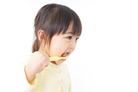 A child brushing her teethの写真素材