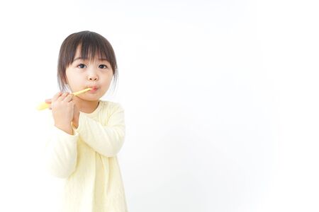 A child brushing her teethの写真素材