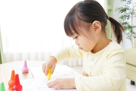 A child painting picturesの写真素材