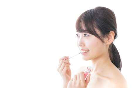 woman making herself upの写真素材