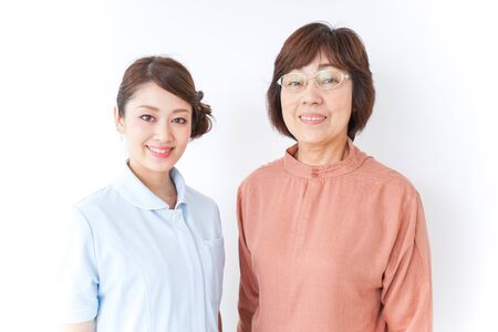 elderly woman and nurseの写真素材