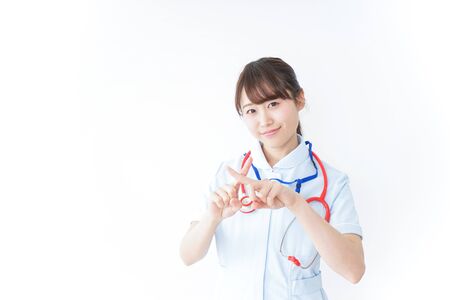 Nurse giving no signの写真素材