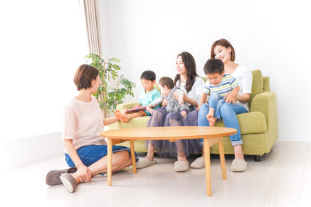 Baby, Children and mother playing at homeの写真素材