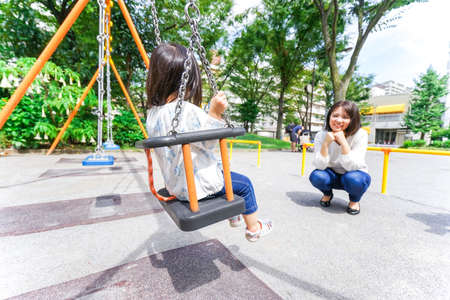 Child playing outsideの写真素材