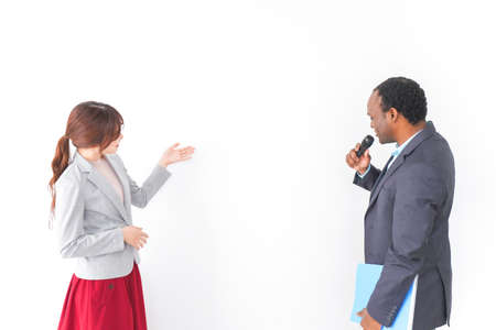 Young business people discussing on white background, Business people talk to each other.の写真素材