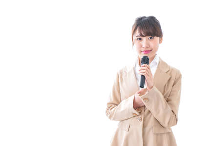 Woman talking with microphoneの写真素材