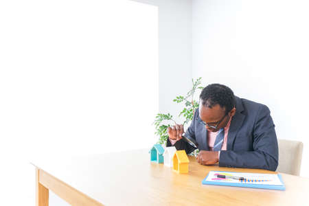 Man working at real estate companyの写真素材