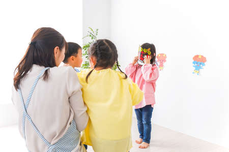 Children and teacher at the Kindergarten, Back to school conceptの写真素材