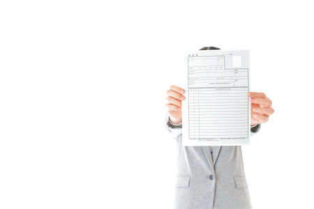 Businessman holding financial report with copy space.
