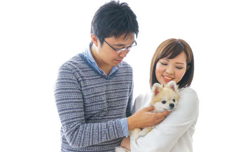 Couple having a dogの写真素材