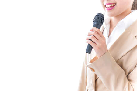 Woman talking with microphoneの写真素材