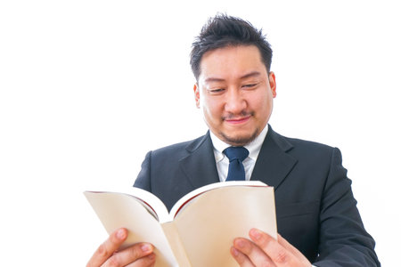Businessperson reading book