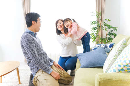 Family having fun at homeの写真素材