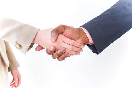 Businesspersons shaking handsの写真素材