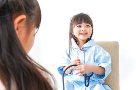 Doctor pretend playの写真素材