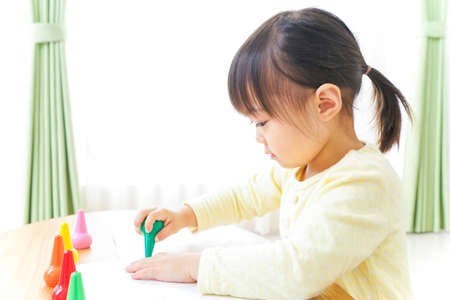 A child painting picturesの写真素材