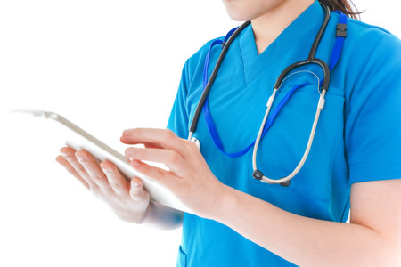 Closeup image of a female doctor using digital tablet isolated on white background