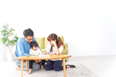 Happy family spending time together at home, shot in the studio.の写真素材