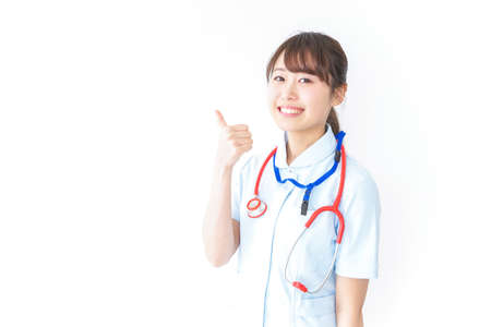 Nurse giving ok signの写真素材