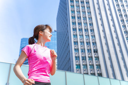 Woman running in city
