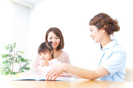 Child and mother at hospitalの写真素材