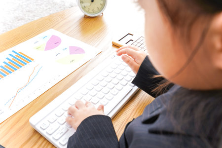 Businesswoman using computer for online shopping, closeup