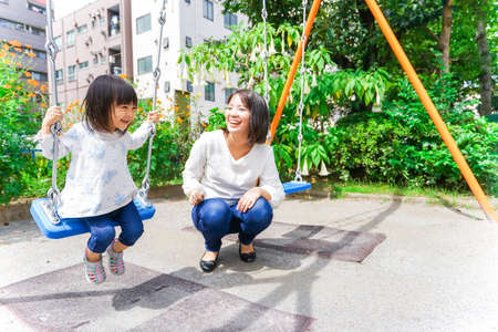 Child playing outsideの写真素材