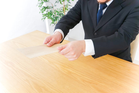 Businessman submitting documents