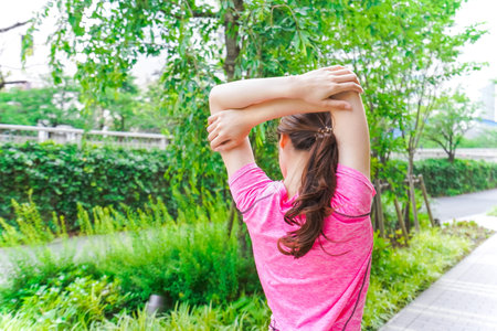 Woman training in forest
