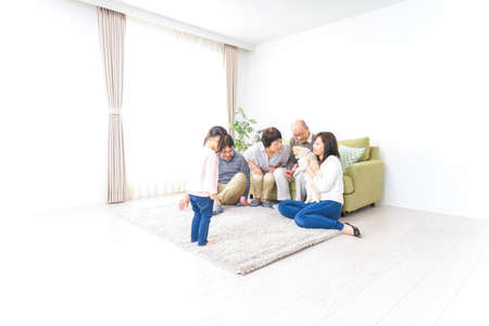 Happy family with dogの写真素材
