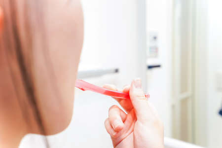 Woman brushing teethの写真素材