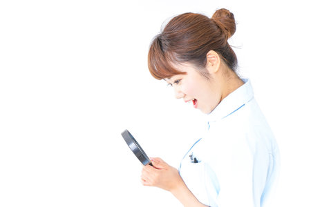 Nurse having loupeの写真素材
